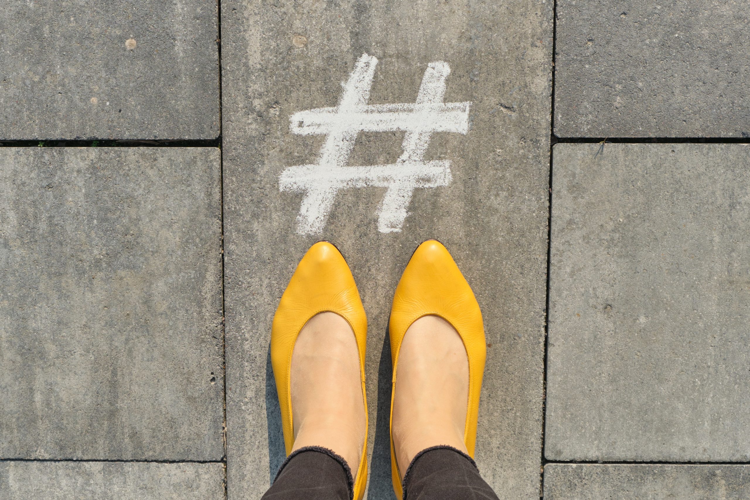 image of a hashtag written in chalk, hashtags for success