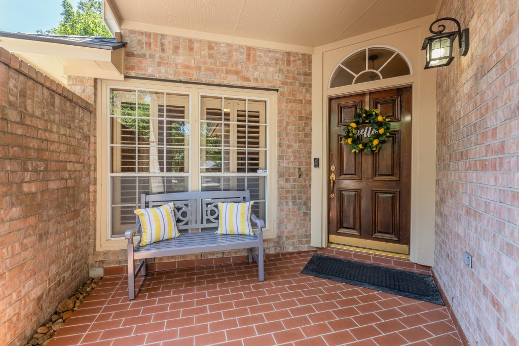 image of a staged front porch to a home to show the steps to preparing for real estate photos