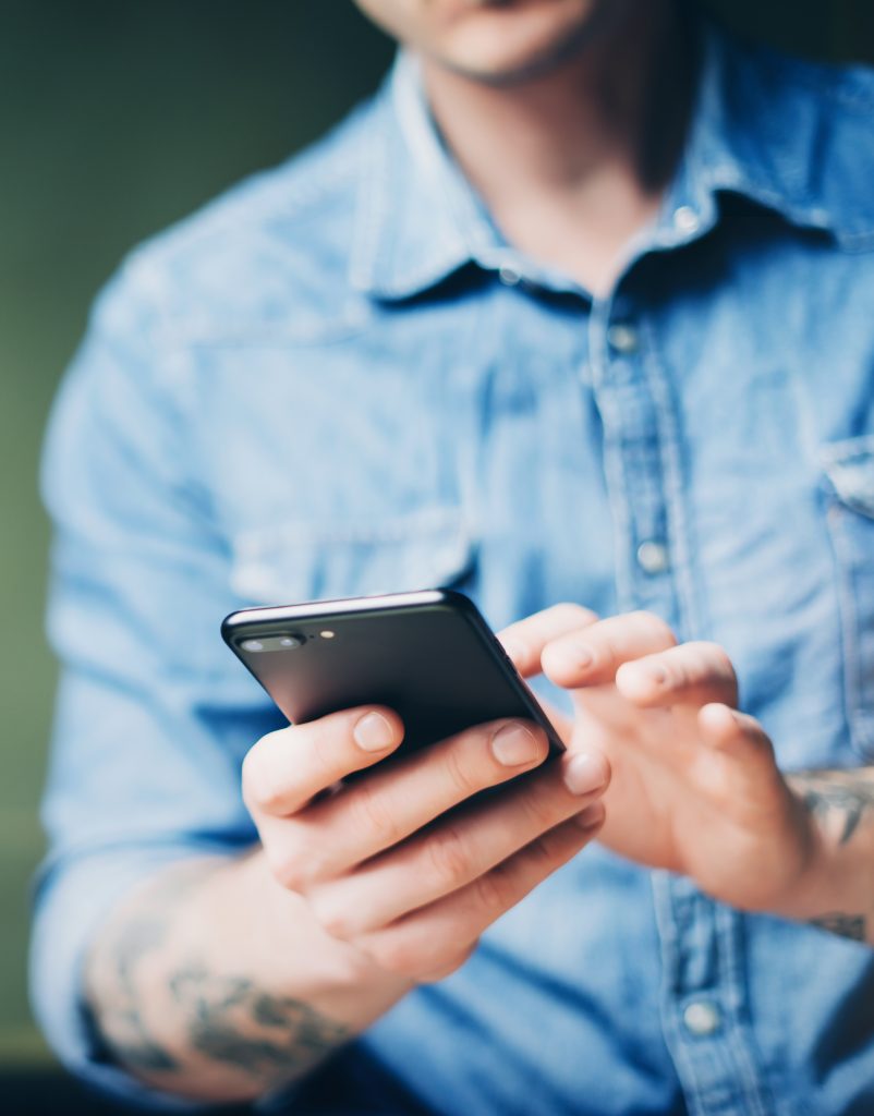 Young man with smartphone