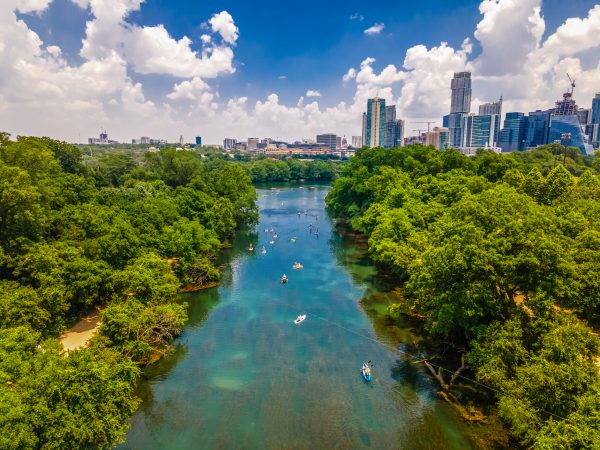 drone image of downtown Austin, Texas and the surrounding landscape