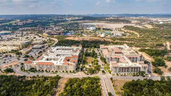 drone view of attractions and amenities near a multi-family property