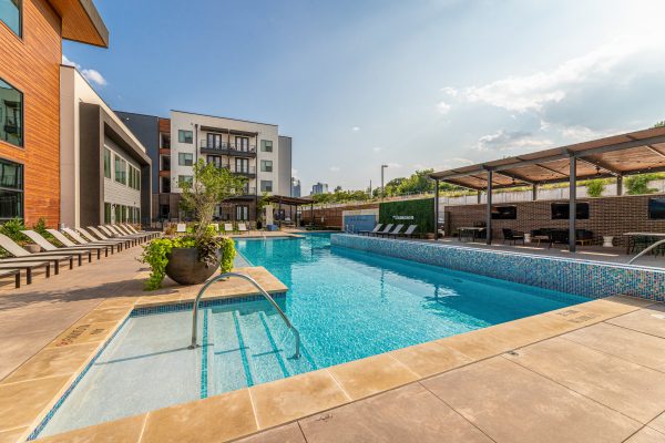 daytime view of the pool at a multi-family property