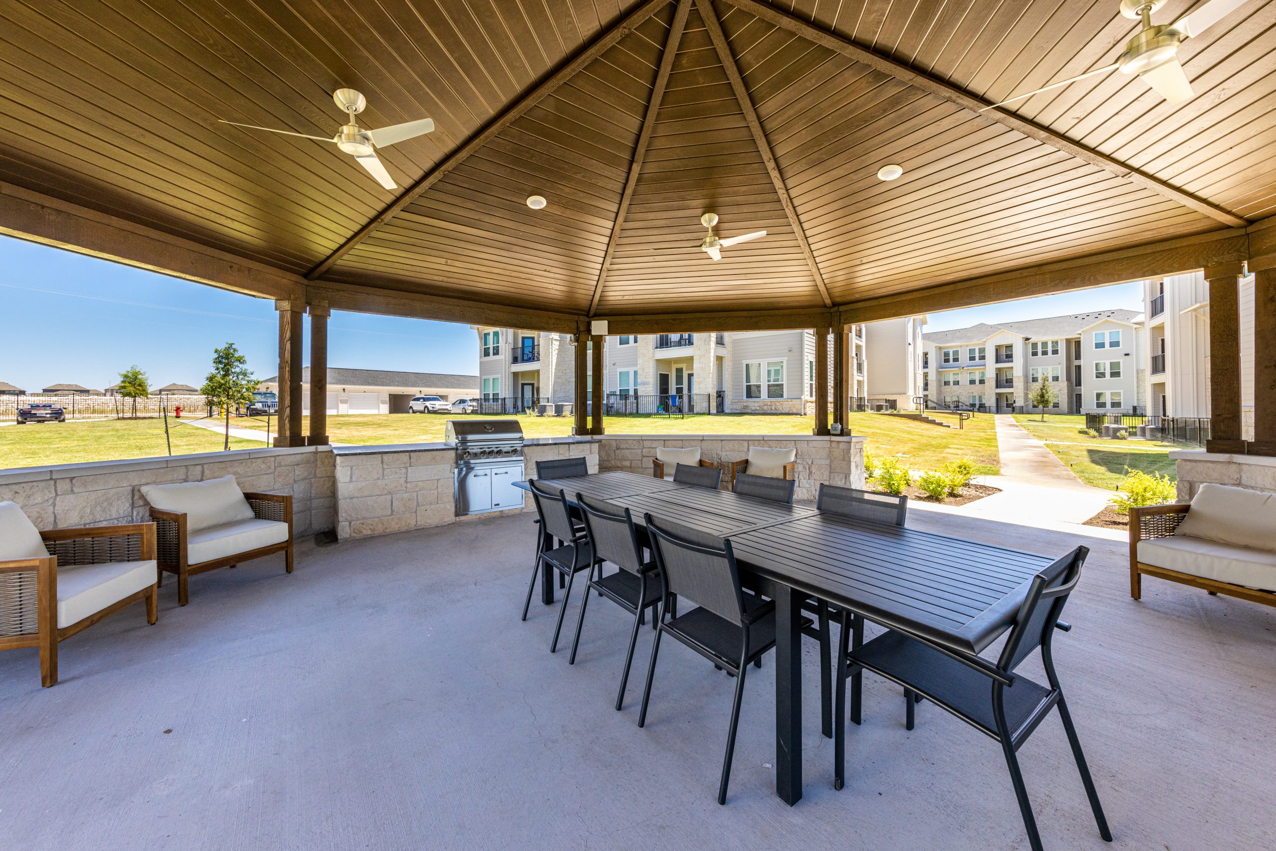daytime view of the outdoor kitchen of a multi-family commercial property