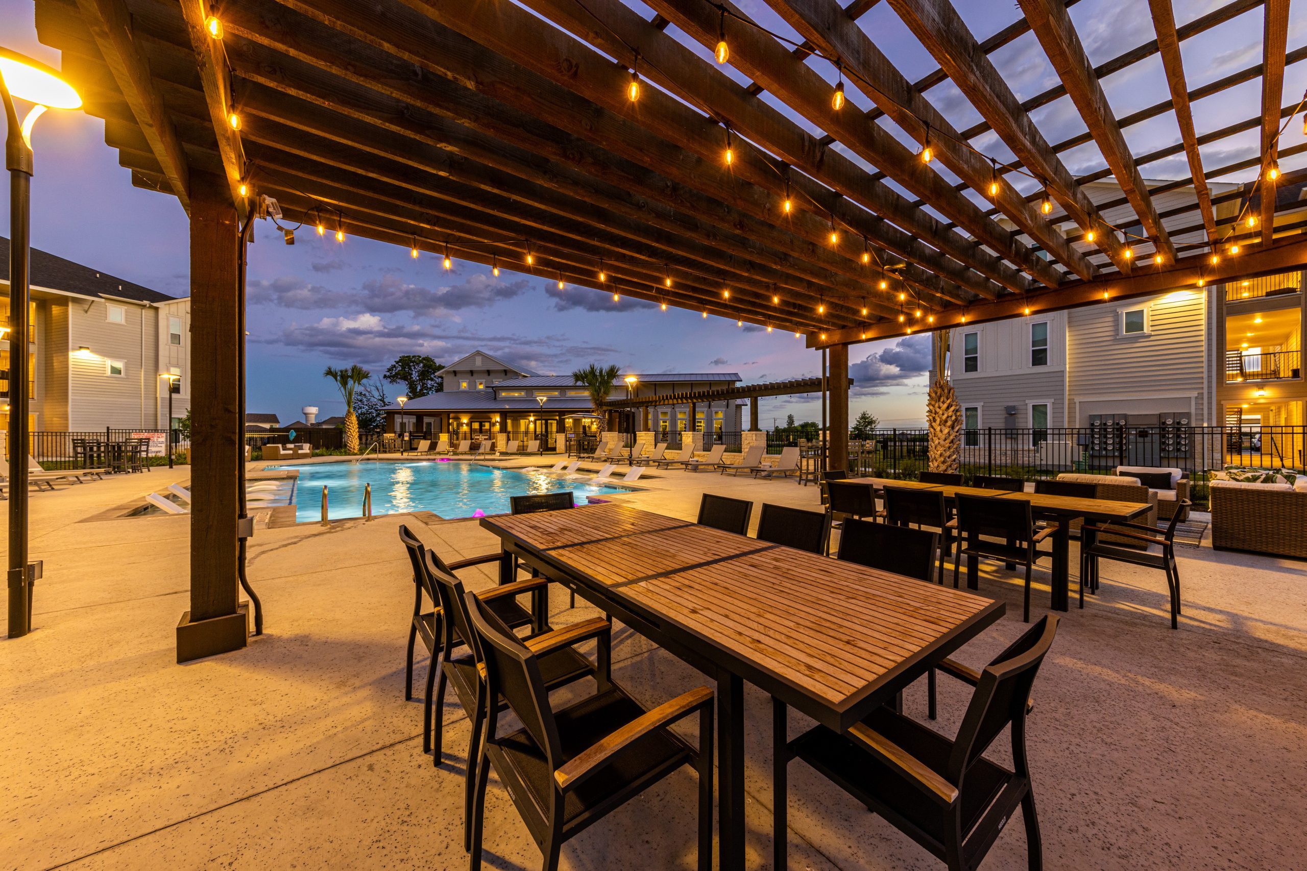 commercial real estate photos: twilight view of the cabana of a multi-family commercial property