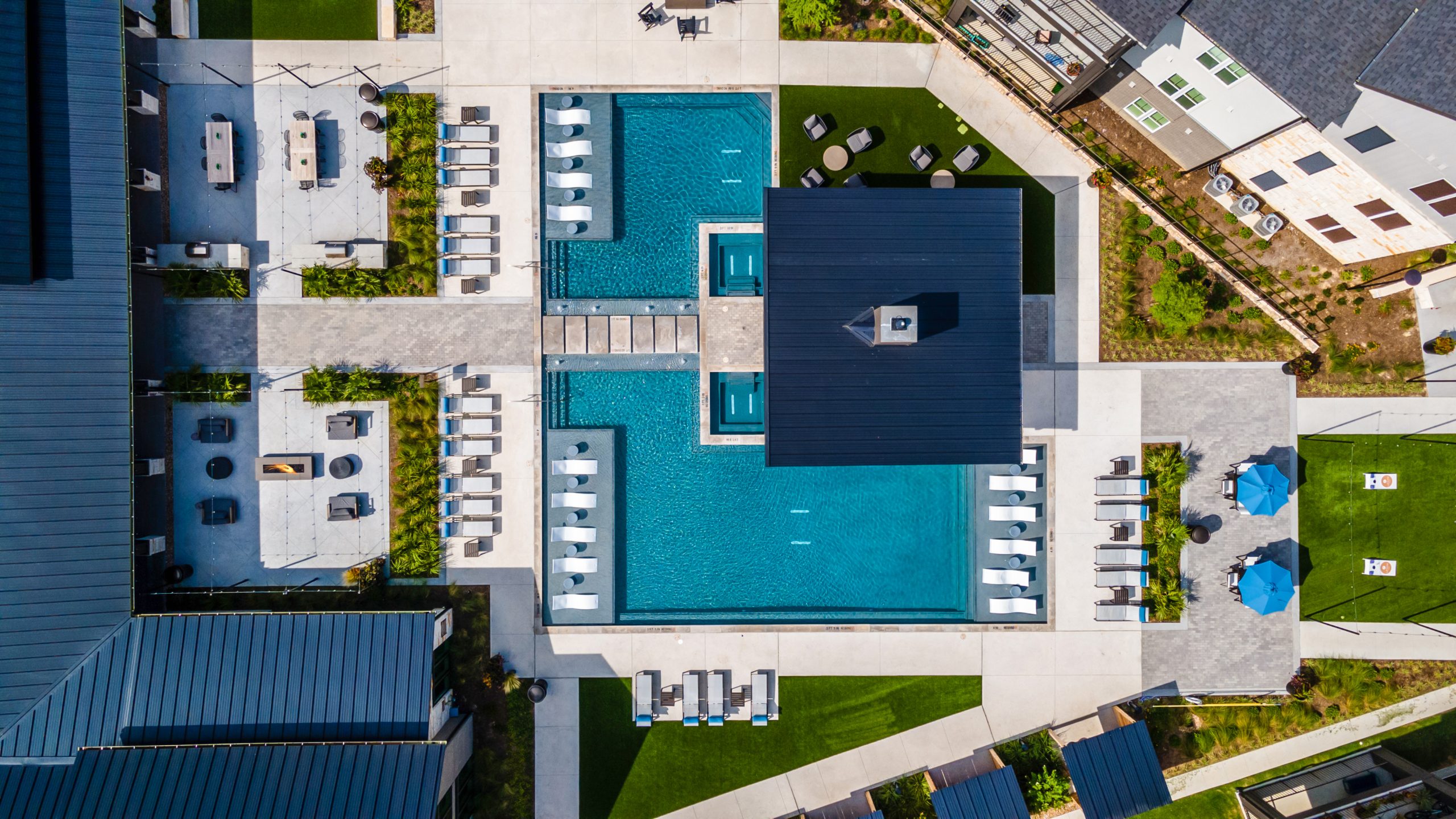 Image of a commercial apartment complex's pool and recreation areas