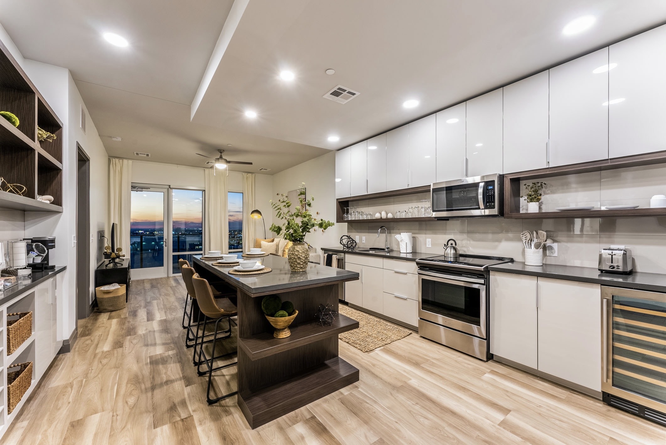 Image of an apartment kitchen with a sunset view