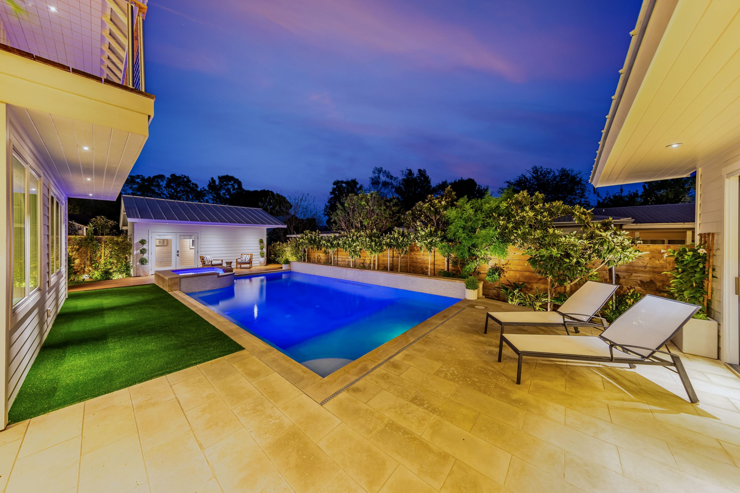 Image of a residential pool in Austin at twilight