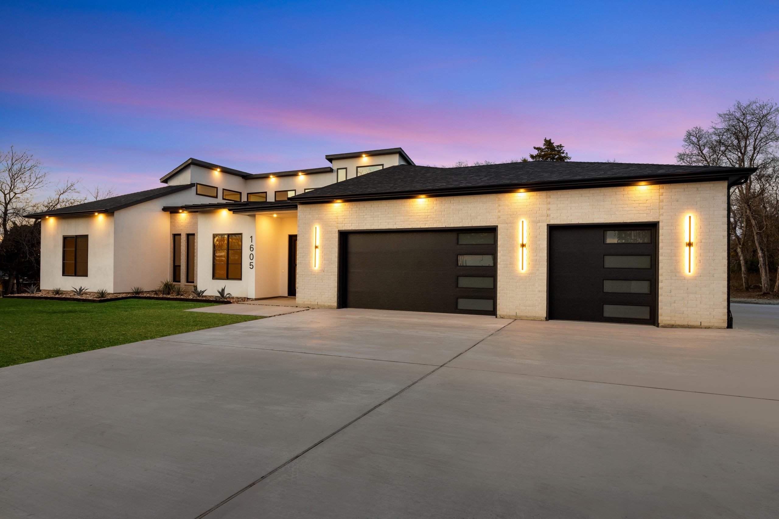Twilight image of front exterior of home