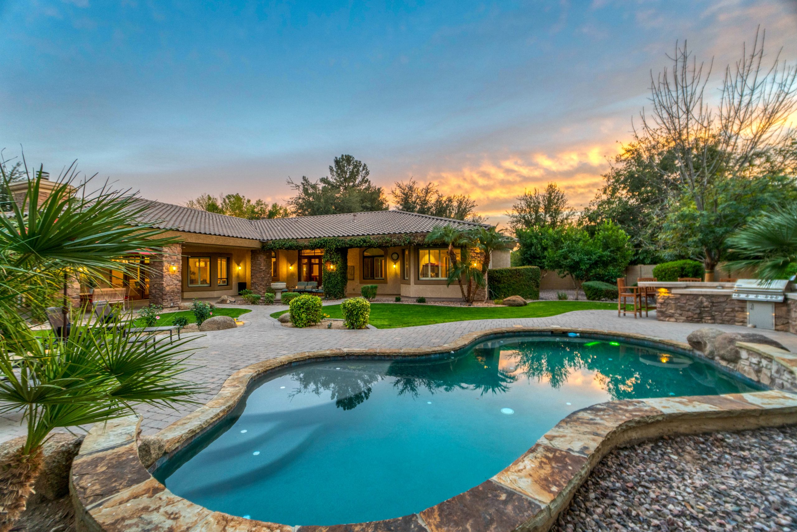 Seasonal Photography: a Residential Home with a pool in Summer